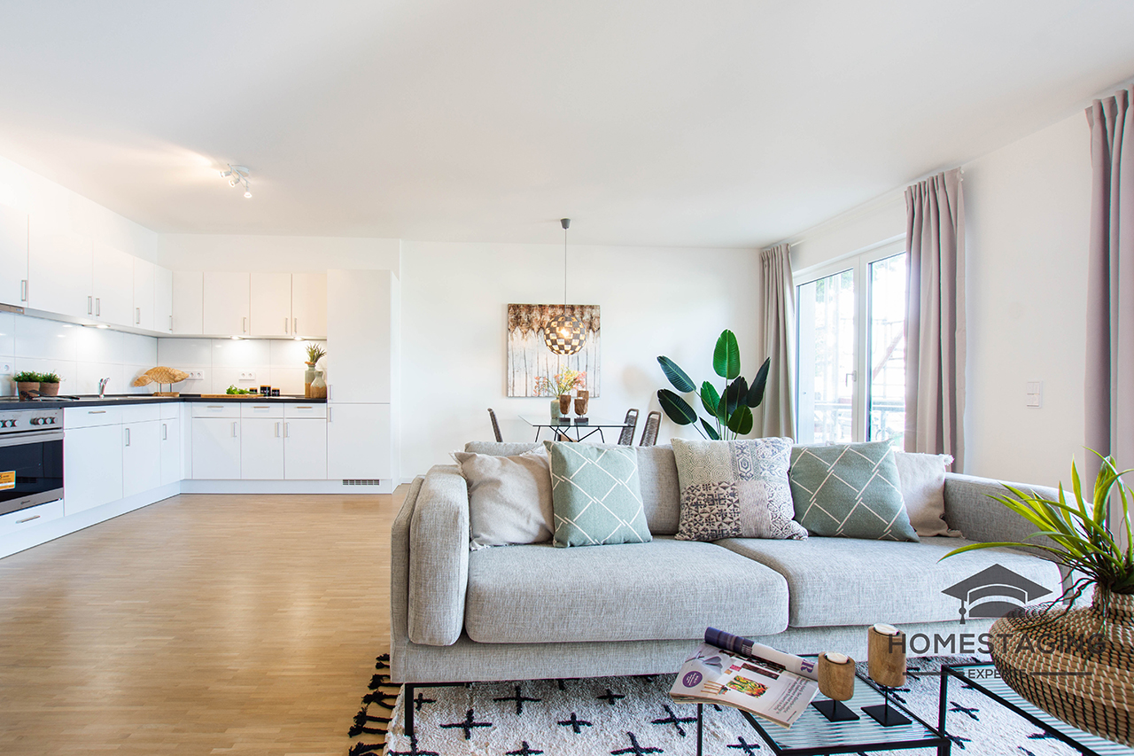 Musterwohnung Wohnzimmer - offene Küche